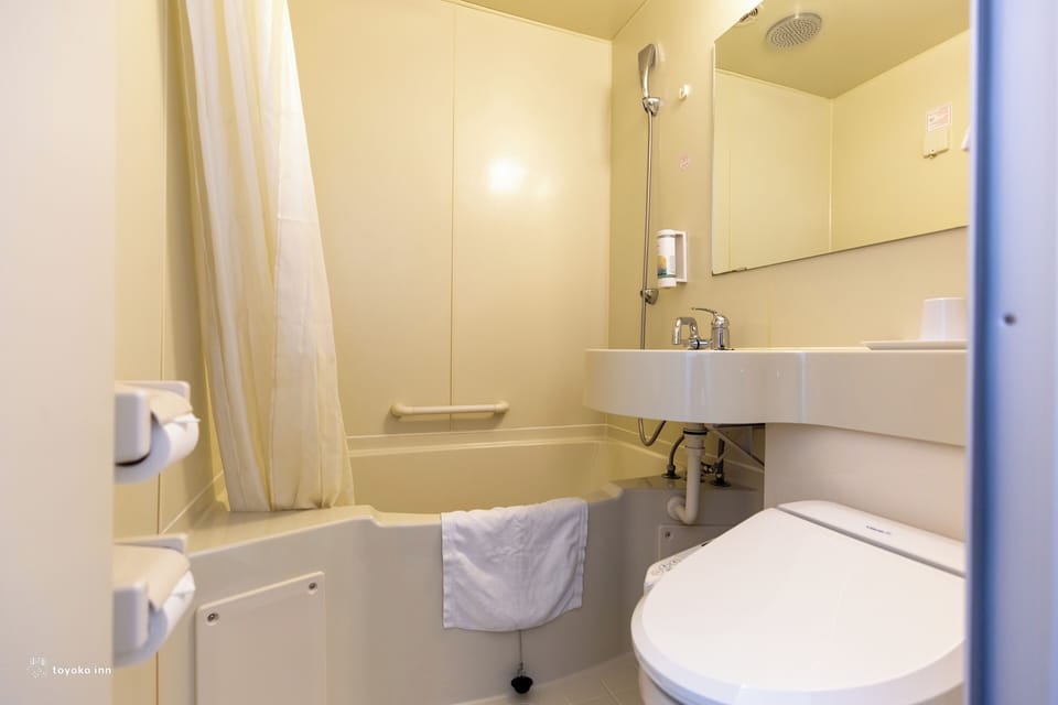Combined shower/tub, deep soaking tub, rainfall showerhead, hair dryer