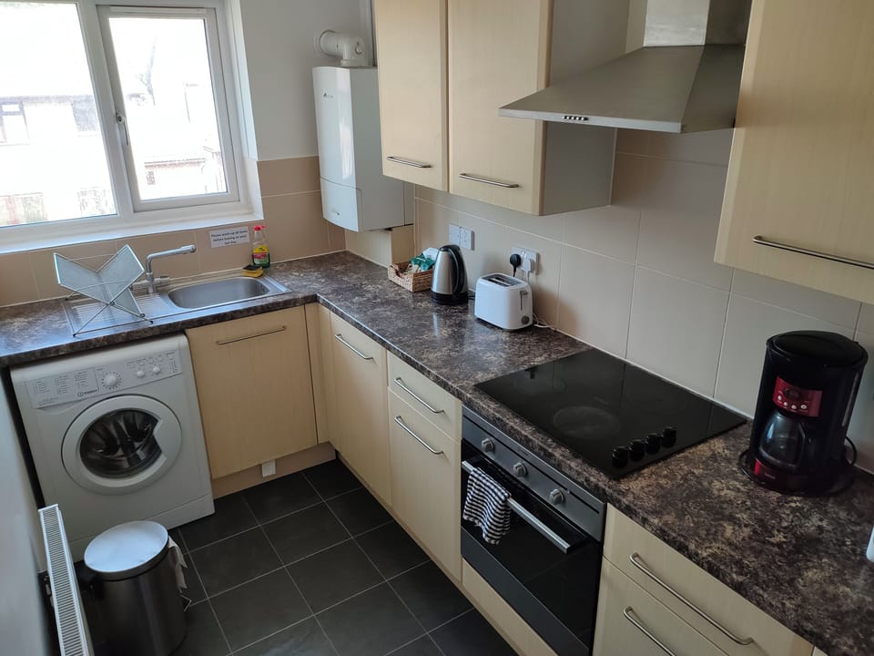 Business Apartment, 1 Bedroom | Private kitchen | Coffee/tea maker, full-size fridge, microwave, oven