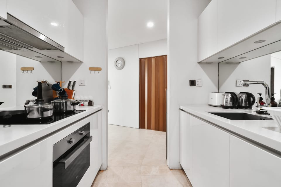 Two Bedroom Apartment | Private kitchen | Full-size fridge, microwave, oven, stovetop