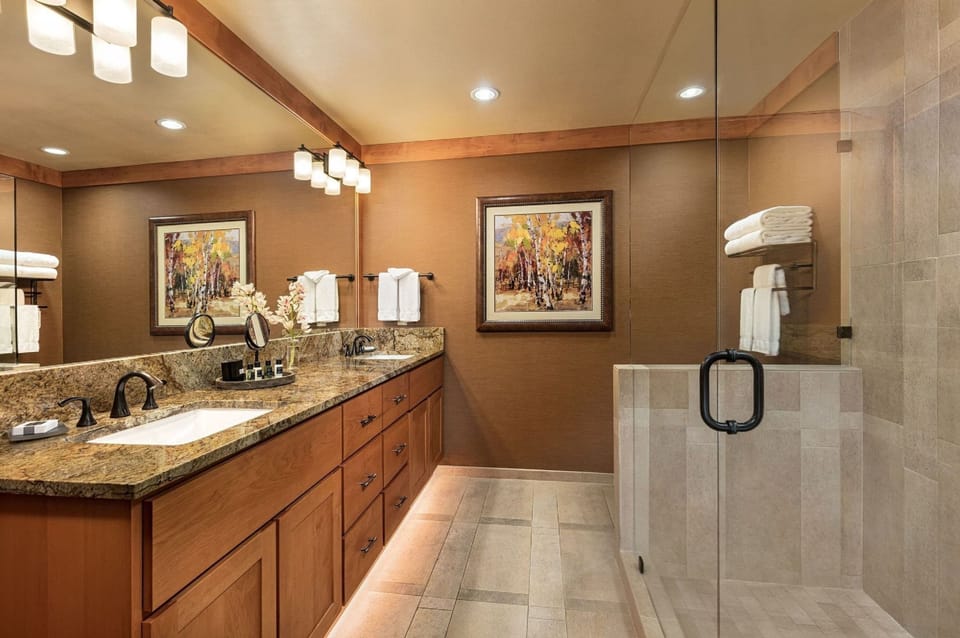 Suite, 1 King Bed (Premium King Junior Suite) | Bathroom | Shower, slippers, towels