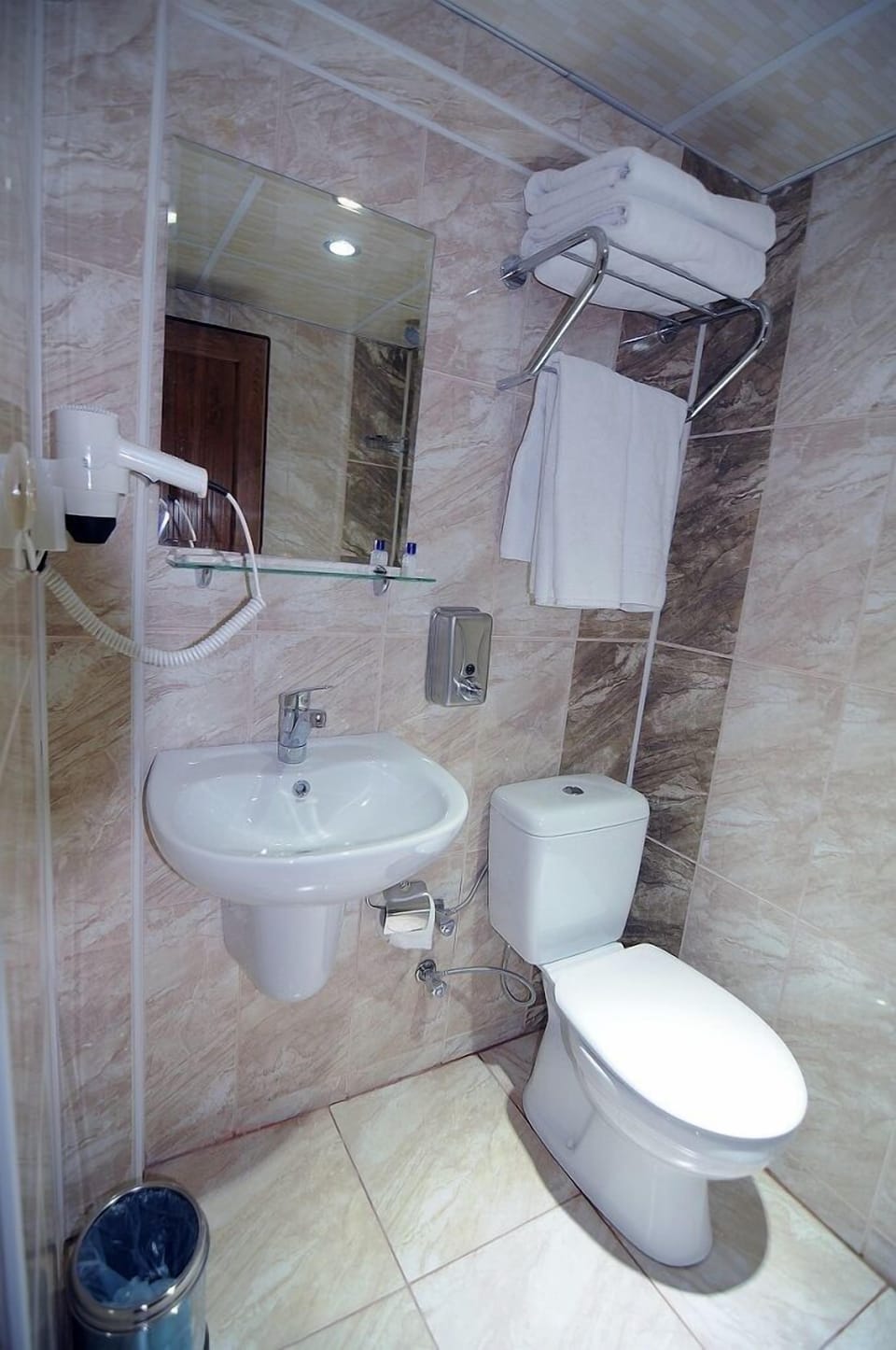 Shower, free toiletries, hair dryer, slippers