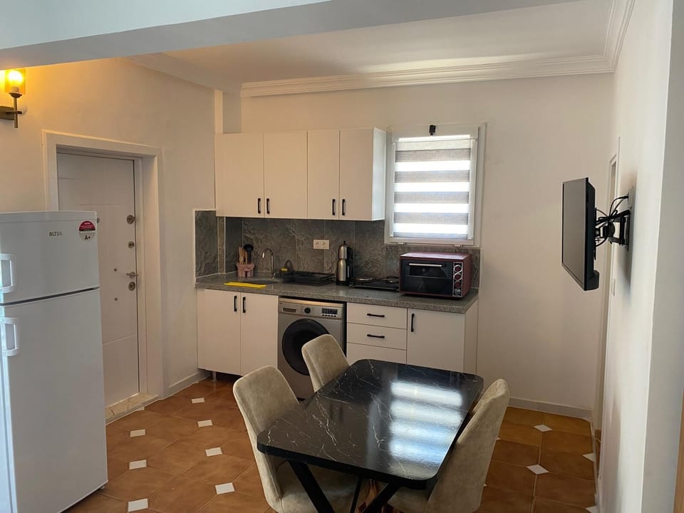 Family Studio Suite | Living area | LCD TV