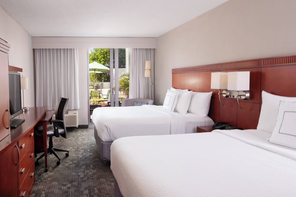Hypo-allergenic bedding, pillowtop beds, in-room safe, desk