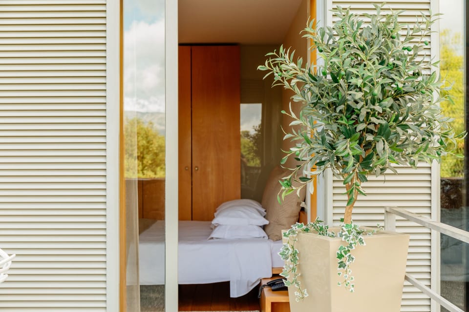 Golf View Terrace | Minibar, in-room safe, desk, blackout drapes