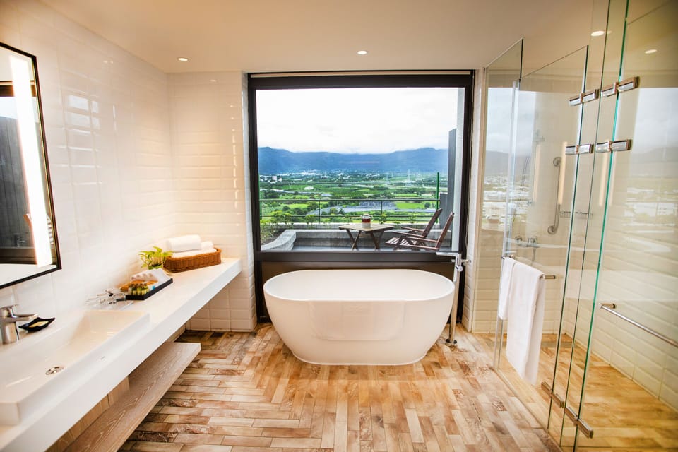 Deluxe Double or Twin Room | Bathroom | Combined shower/tub, hair dryer, slippers, towels