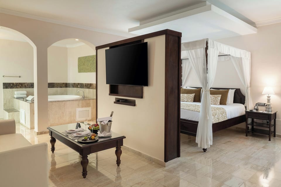 Premium bedding, down comforters, free minibar, in-room safe