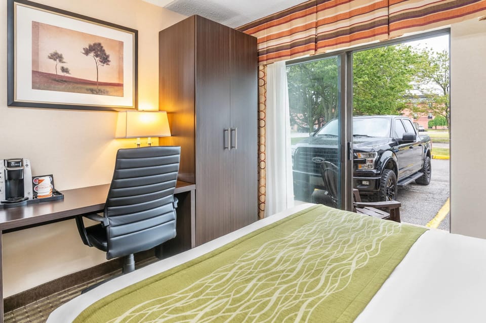 Premium bedding, desk, blackout drapes, iron/ironing board