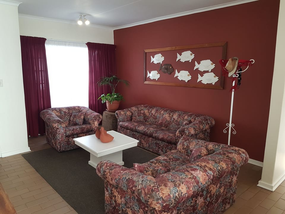 2 Bedroom Apartment | Living room | Flat-screen TV
