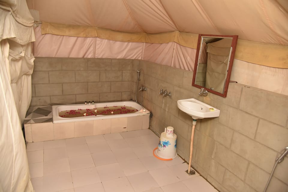 Luxury Tent, Resort View | Bathroom | Shower, free toiletries, towels