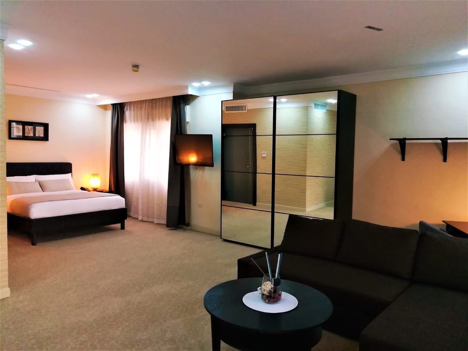 Exclusive Suite, 1 King Bed with Sofa bed | 1 bedroom, premium bedding, minibar, in-room safe