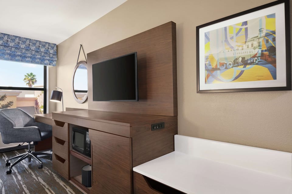 Blackout drapes, iron/ironing board, free cribs/infant beds, free WiFi