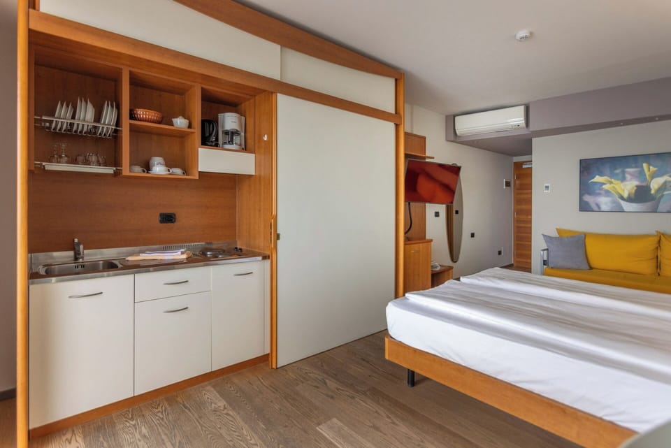 Superior Double Room, Lake View | Private kitchen | Fridge