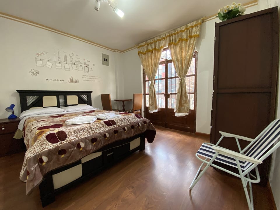 Basic Double Room, 1 Queen Bed | 1 bedroom, in-room safe, WiFi (free), bed sheets