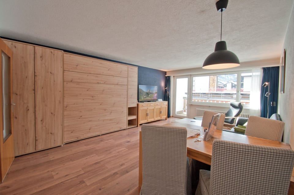 Apartment, 1 Bedroom | Living area | Flat-screen TV, DVD player