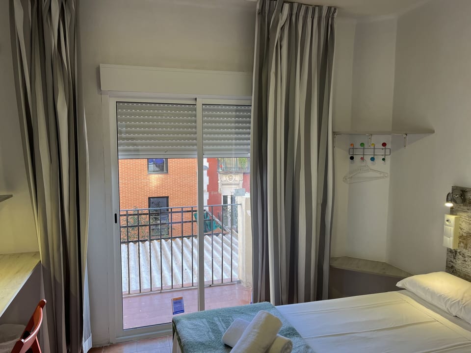 Twin Room, Shared Bathroom | Desk, blackout drapes, free WiFi, bed sheets