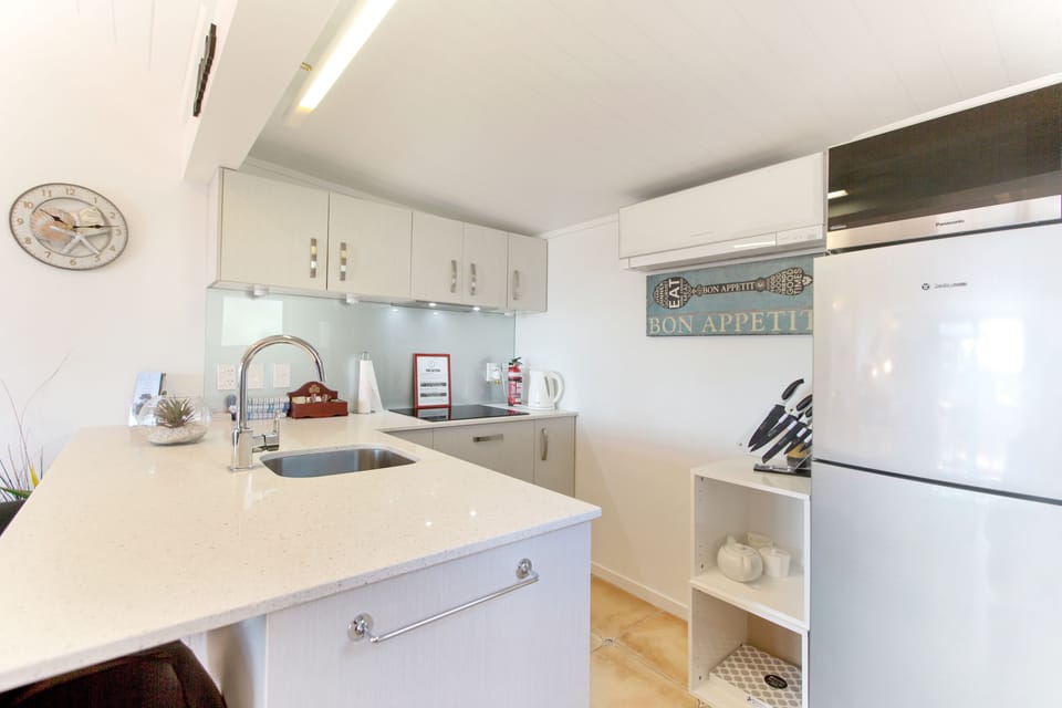 Premium Apartment, 1 Bedroom, Ocean View | Private kitchen | Full-size fridge, microwave, stovetop, coffee/tea maker