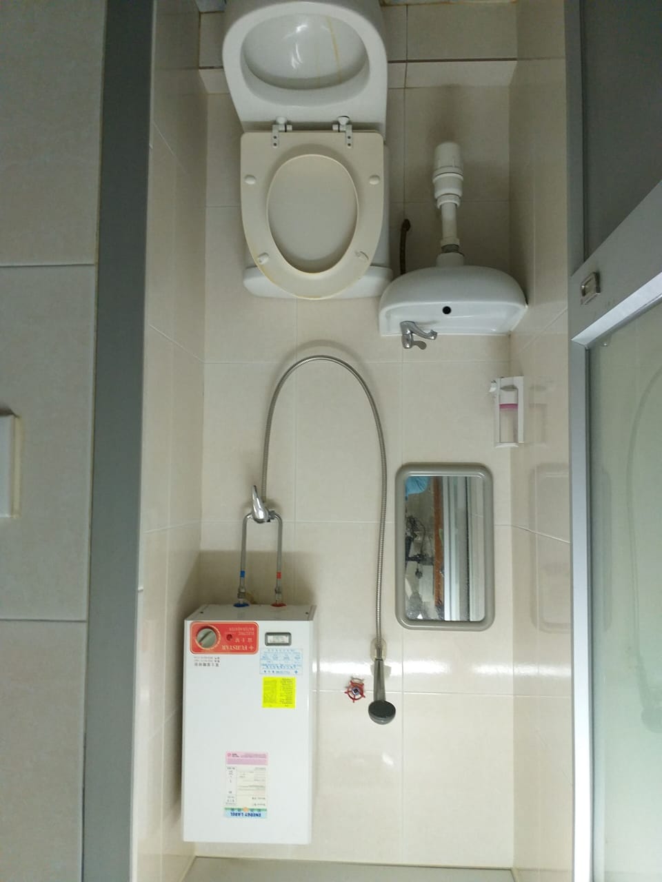 Shower, free toiletries, hair dryer, slippers