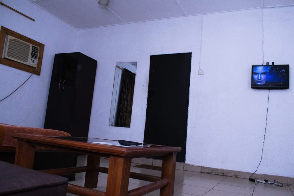 Standard Double Room | Living area | TV