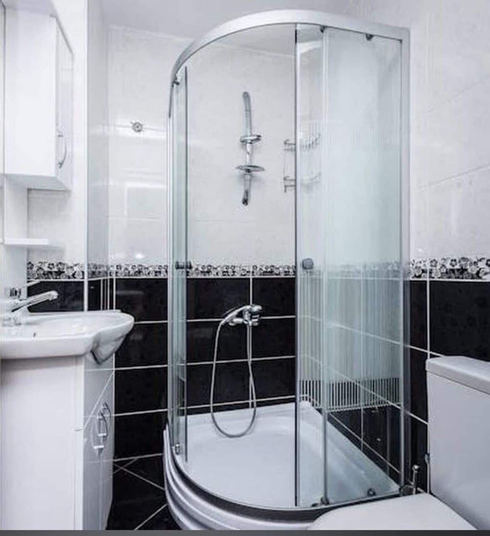Shower, free toiletries, hair dryer, slippers