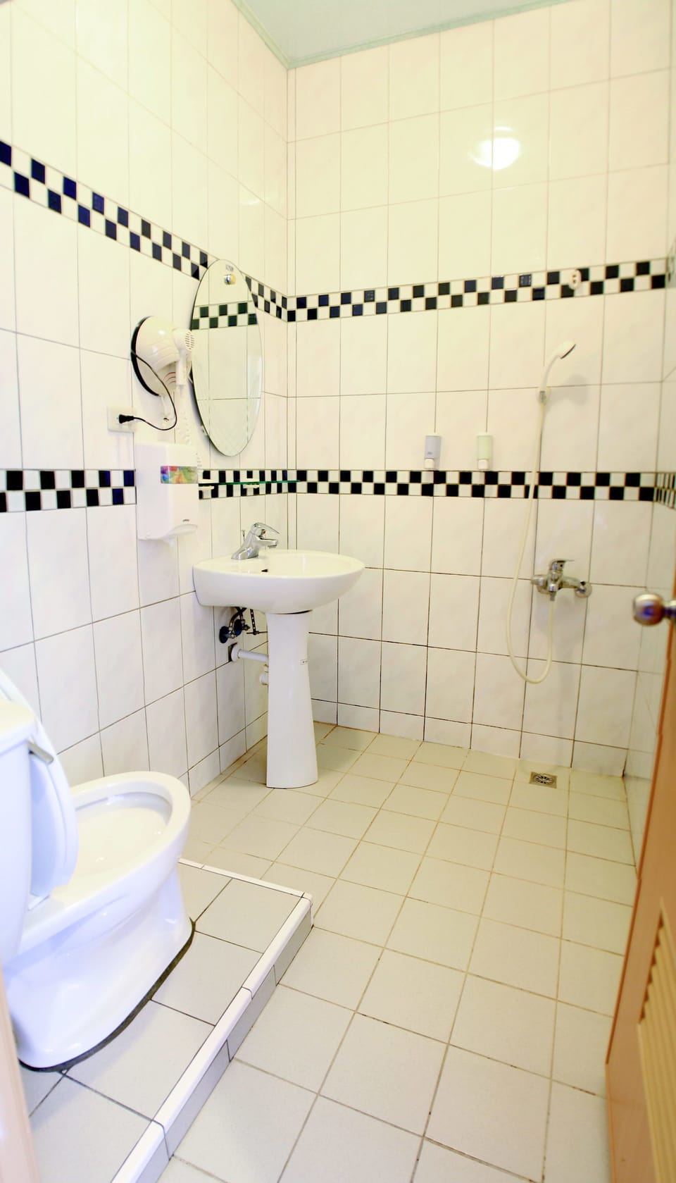 Shower, free toiletries, hair dryer, slippers