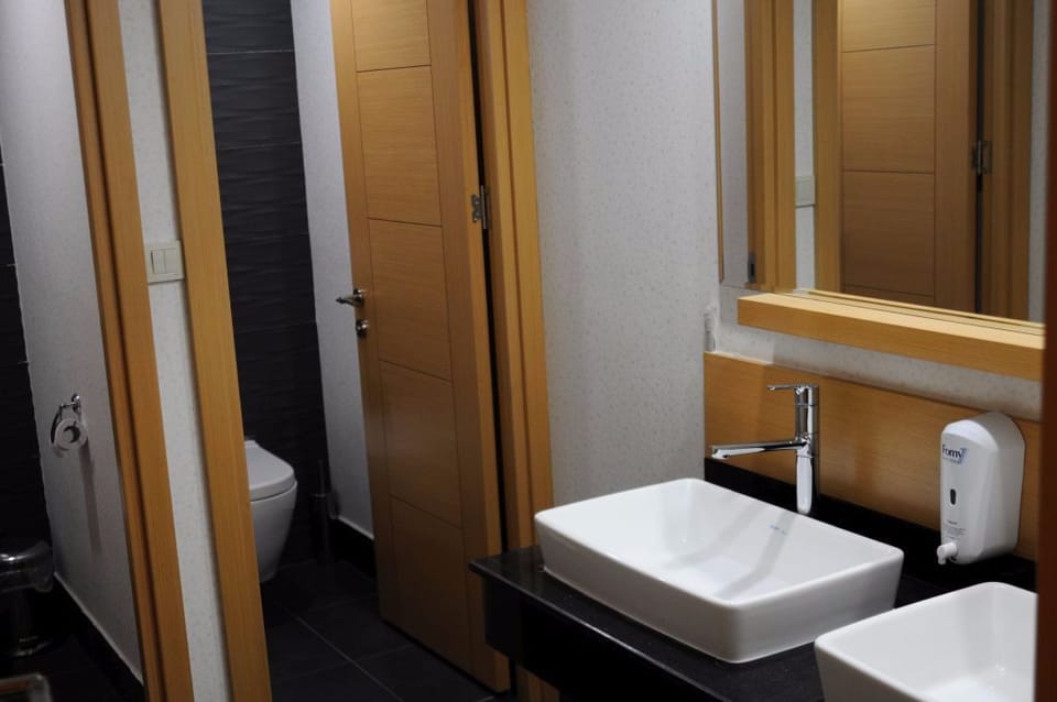 Shower, free toiletries, hair dryer, slippers