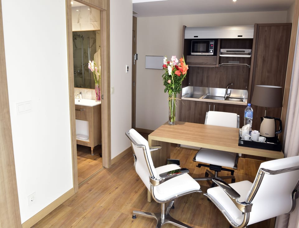 Suite, Sea View (Paradis) | Minibar, in-room safe, desk, blackout drapes