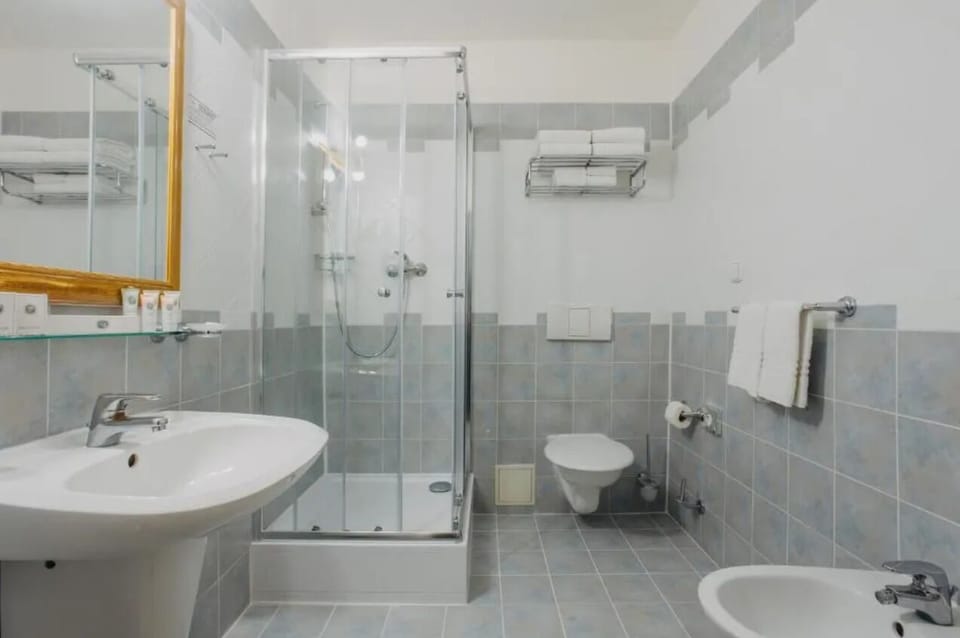 Shower, free toiletries, hair dryer, towels