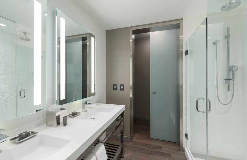 Suite, 1 Bedroom | Bathroom | Rainfall showerhead, free toiletries, hair dryer, towels
