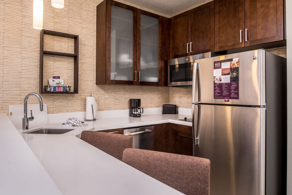 Full-size fridge, microwave, stovetop, dishwasher