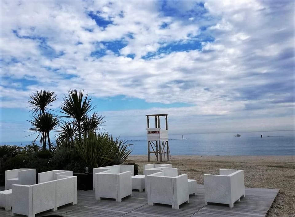 Private beach, sun loungers, beach umbrellas, beach bar