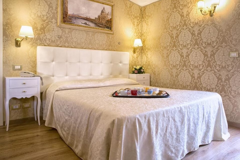Down comforters, pillowtop beds, in-room safe, desk
