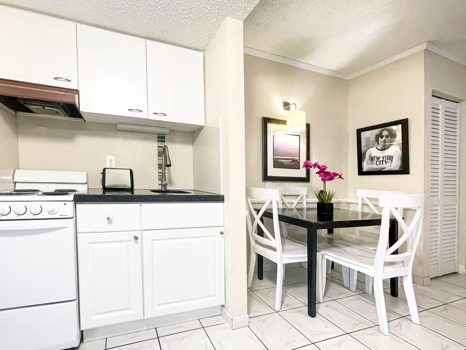 Fridge, microwave, stovetop, coffee/tea maker