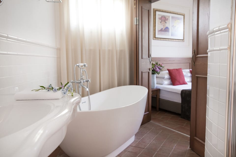 Separate tub and shower, free toiletries, hair dryer, bathrobes