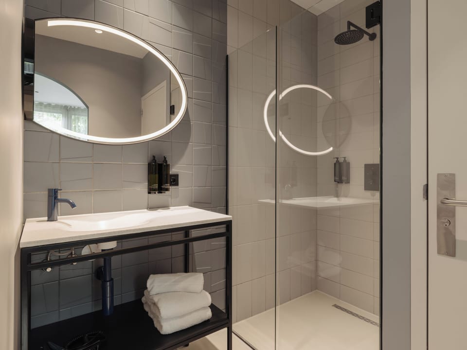 Eco-friendly toiletries, hair dryer, towels, soap