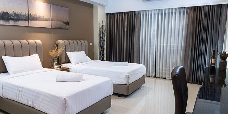 Egyptian cotton sheets, premium bedding, minibar, in-room safe