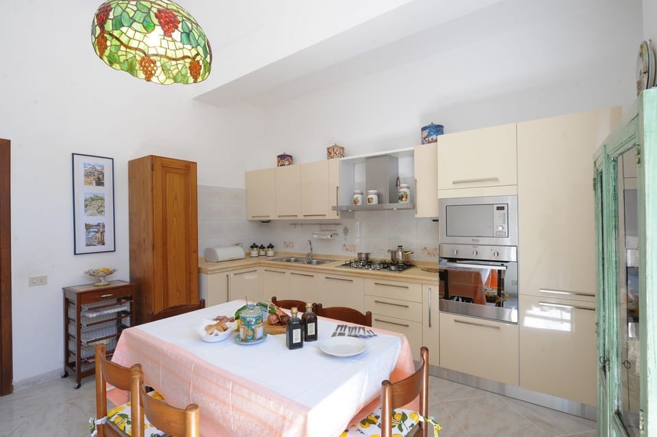 Apartment, 2 Bedrooms | Private kitchen | Fridge, microwave, oven, stovetop