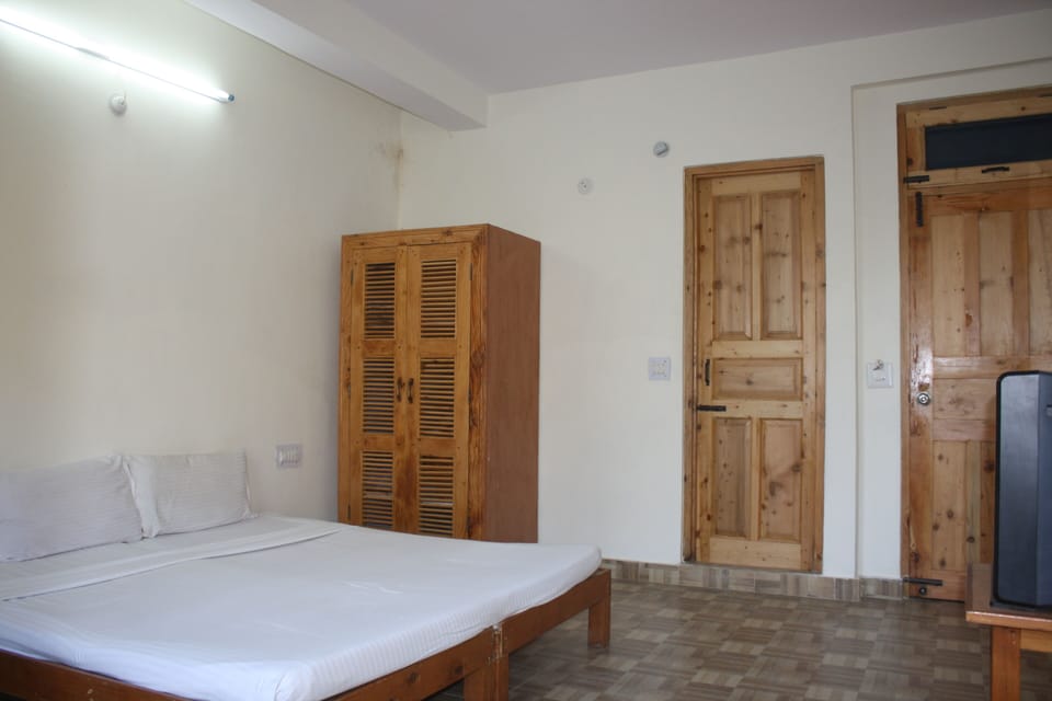 Basic Double Room, 1 Queen Bed | Free WiFi, bed sheets