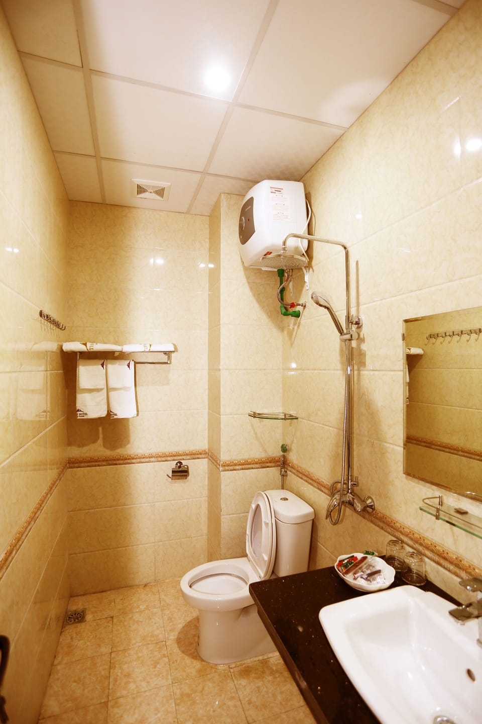 Shower, free toiletries, hair dryer, slippers