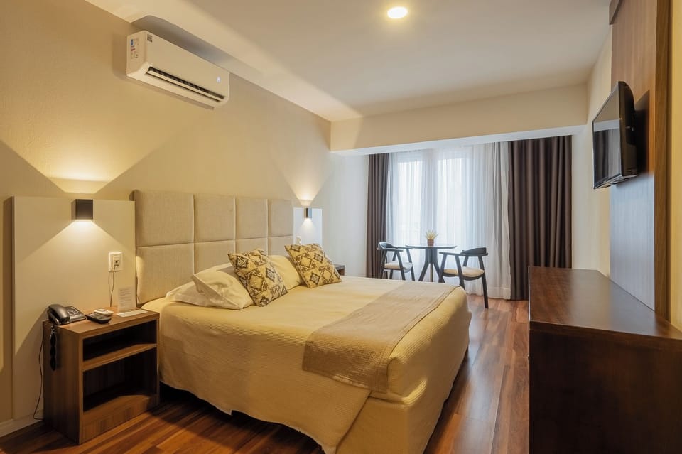 Basic Double or Twin Room | Minibar, desk, blackout drapes, soundproofing