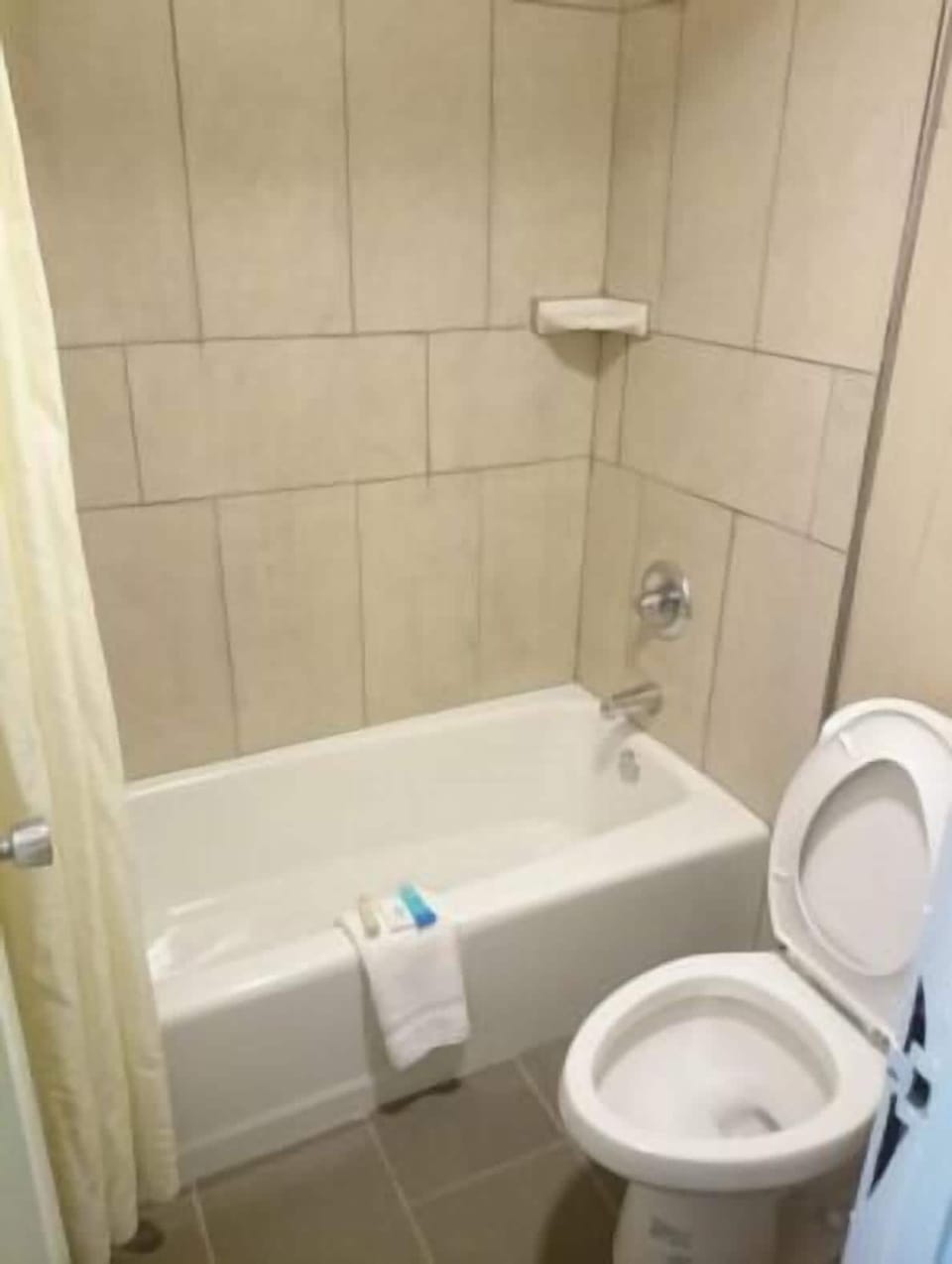 Room, 1 King Bed, Non Smoking | Bathroom | Shower, free toiletries, hair dryer, towels