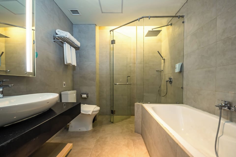 Executive Double Room | Bathroom | Shower, free toiletries, slippers, towels