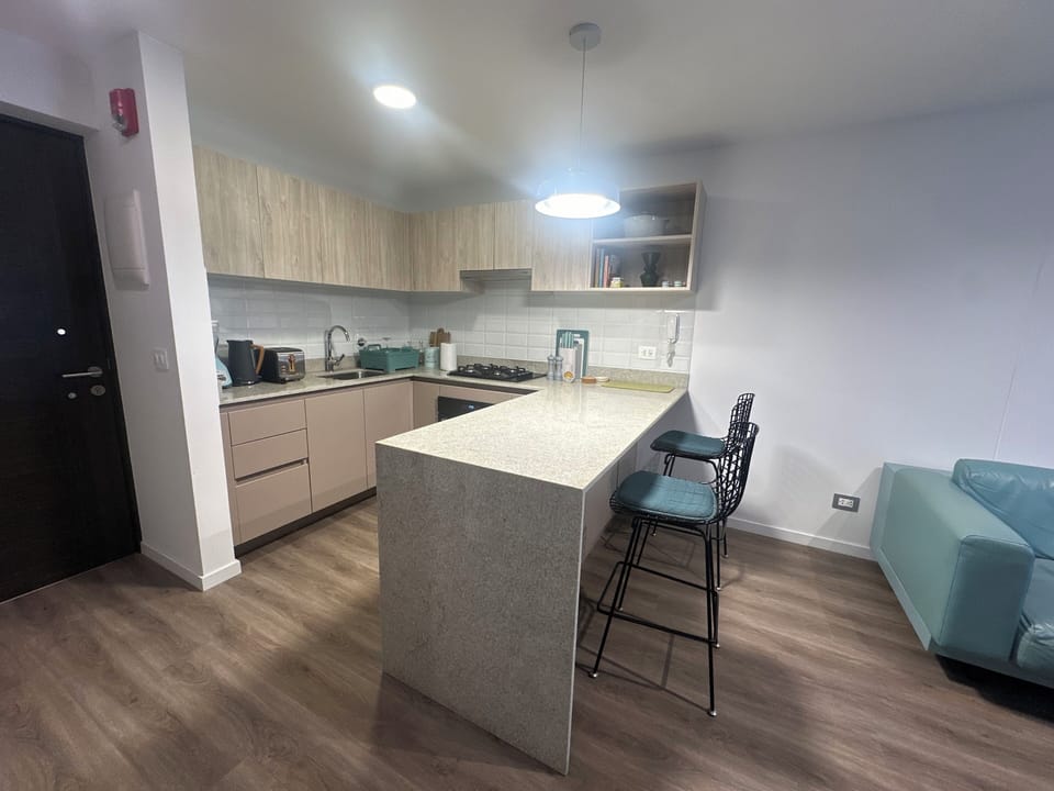 Fridge, microwave, cookware/dishes/utensils