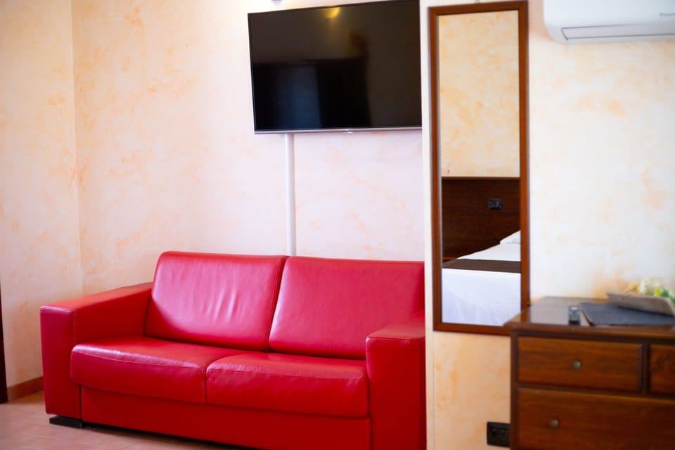 Standard Triple Room, Pool View | In-room safe, iron/ironing board, free WiFi, bed sheets