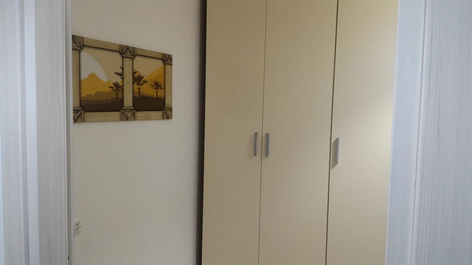 Family Apartment, 1 Bedroom, Garden View | Premium bedding, iron/ironing board, cribs/infant beds, free WiFi