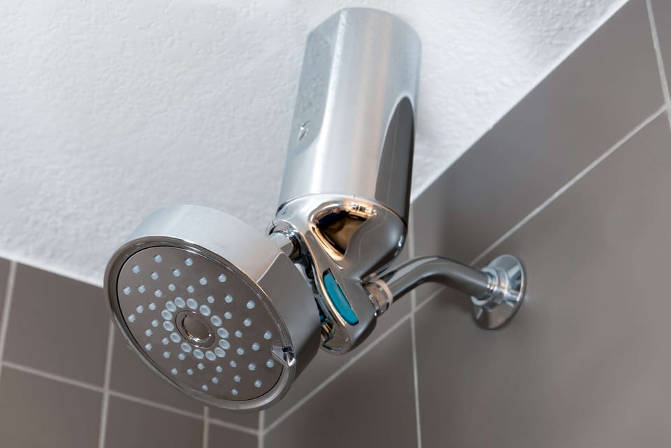 Combined shower/tub, eco-friendly toiletries, hair dryer, towels