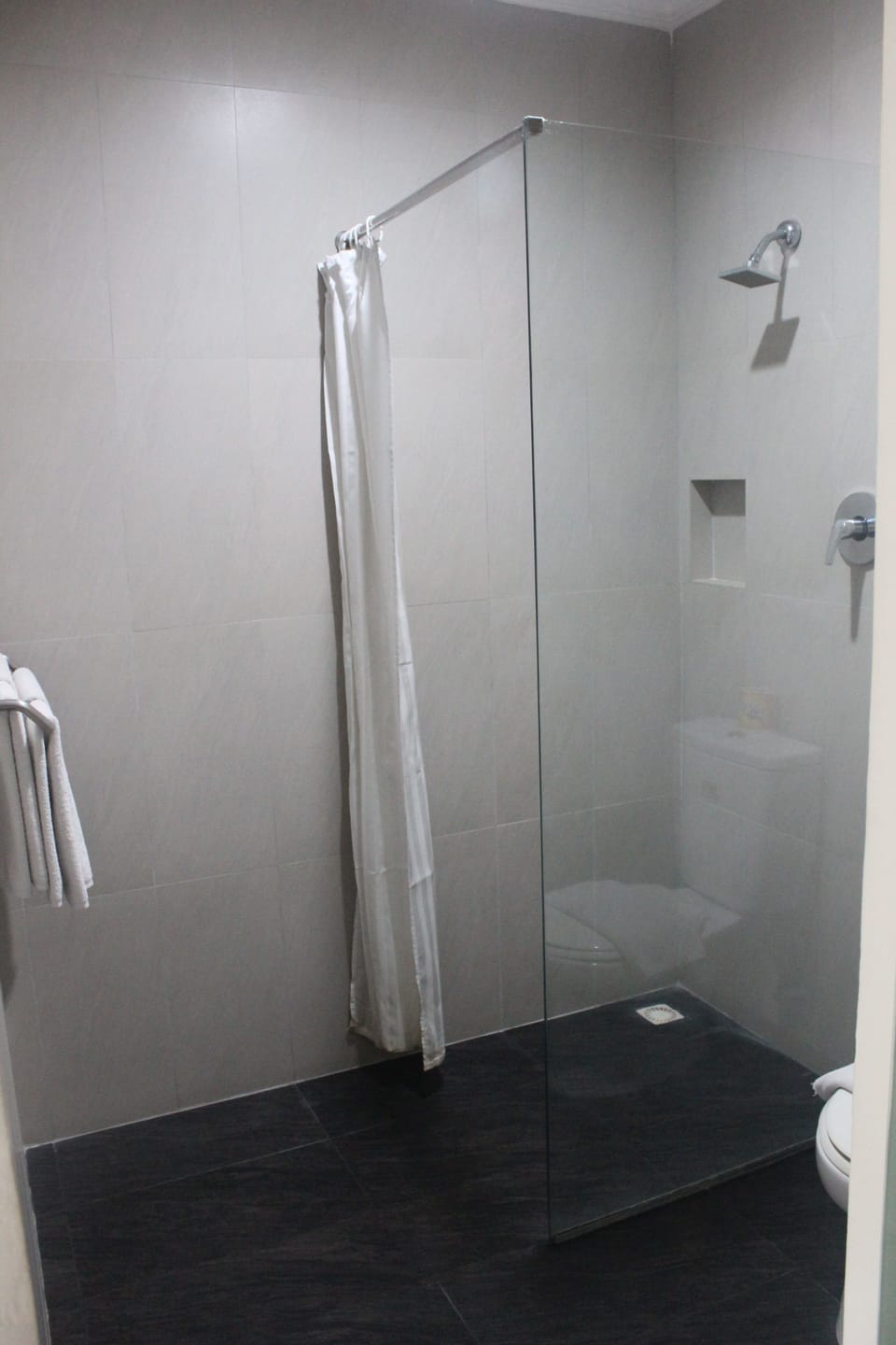 Shower, free toiletries, hair dryer, slippers