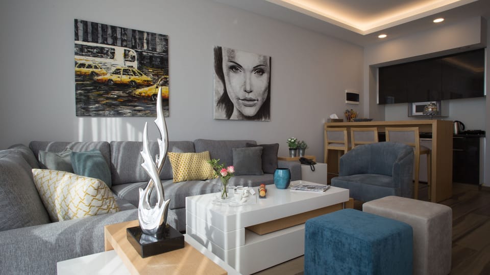 Superior Apartment, 1 Bedroom, Sea View | Living area | 40-inch LED TV with cable channels, TV