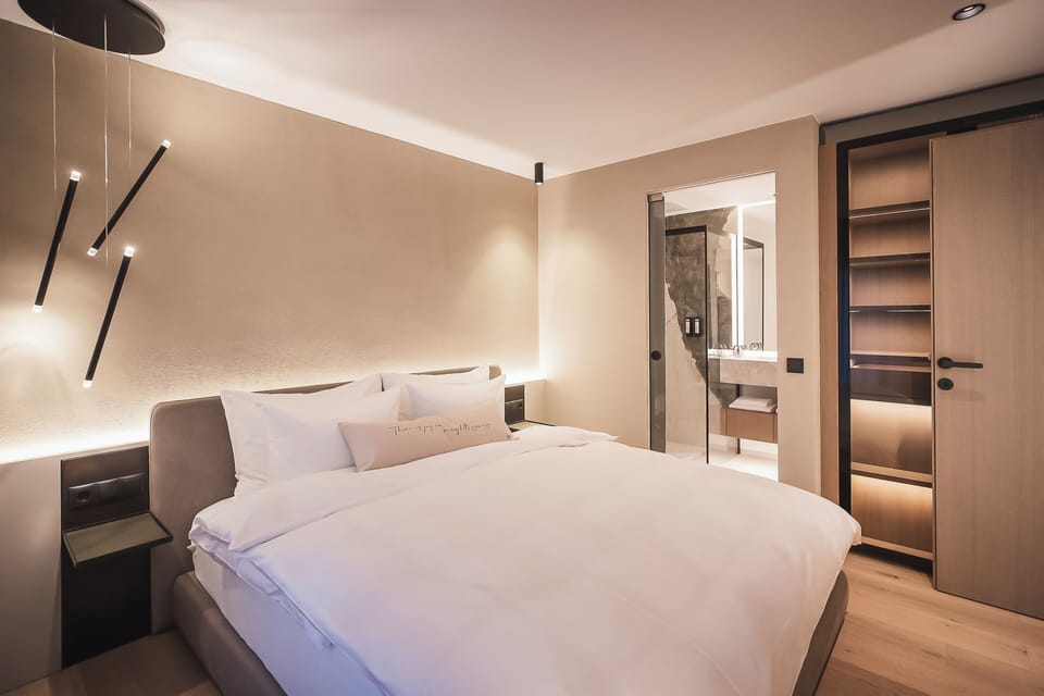 Luxury Suite | Minibar, in-room safe, individually furnished, desk