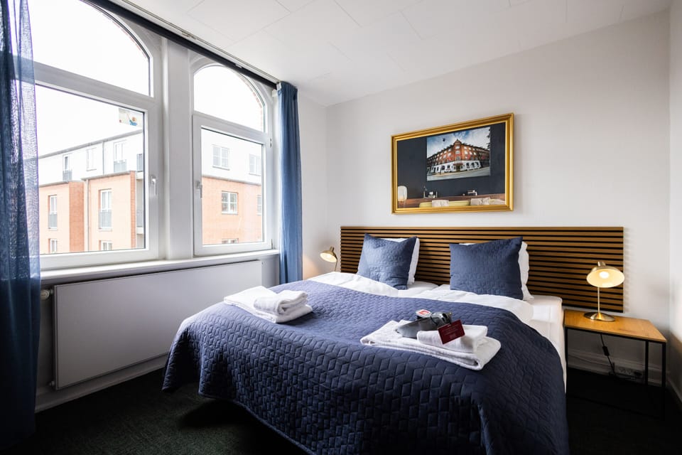 Double Room | Desk, iron/ironing board, free WiFi, bed sheets