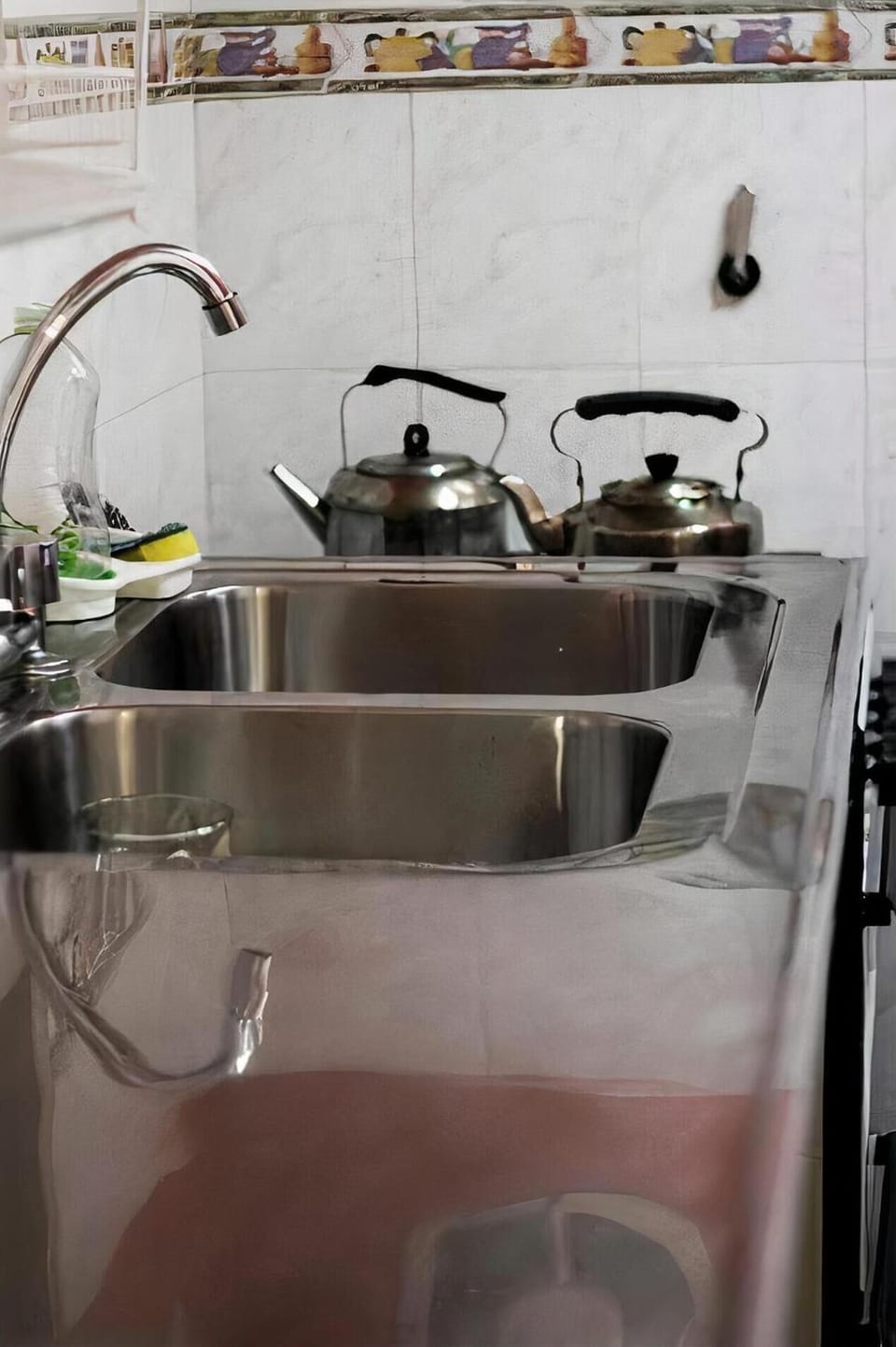 Full-size fridge, coffee/tea maker, cookware/dishes/utensils